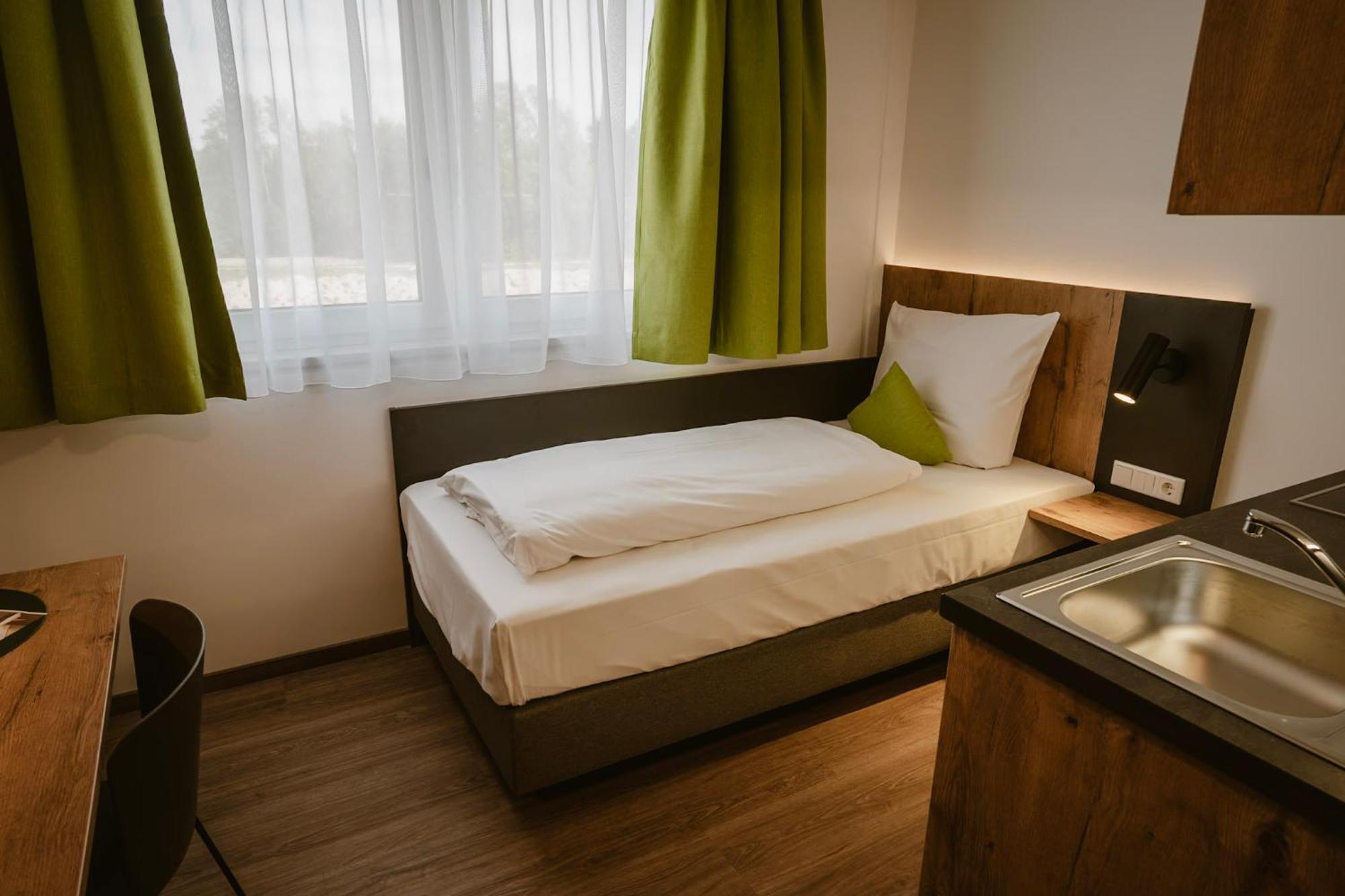 Motel Sleep Inn Toging am Inn Bagian luar foto